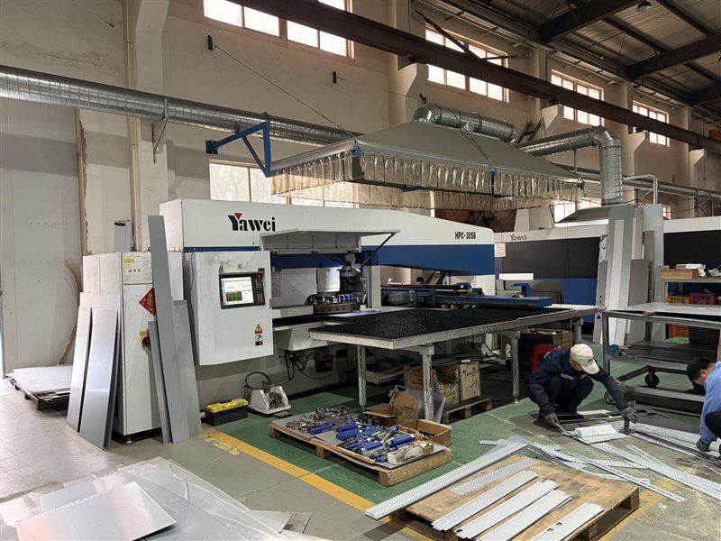 Sheet-metal processing equipment on LANSGRID's production floor